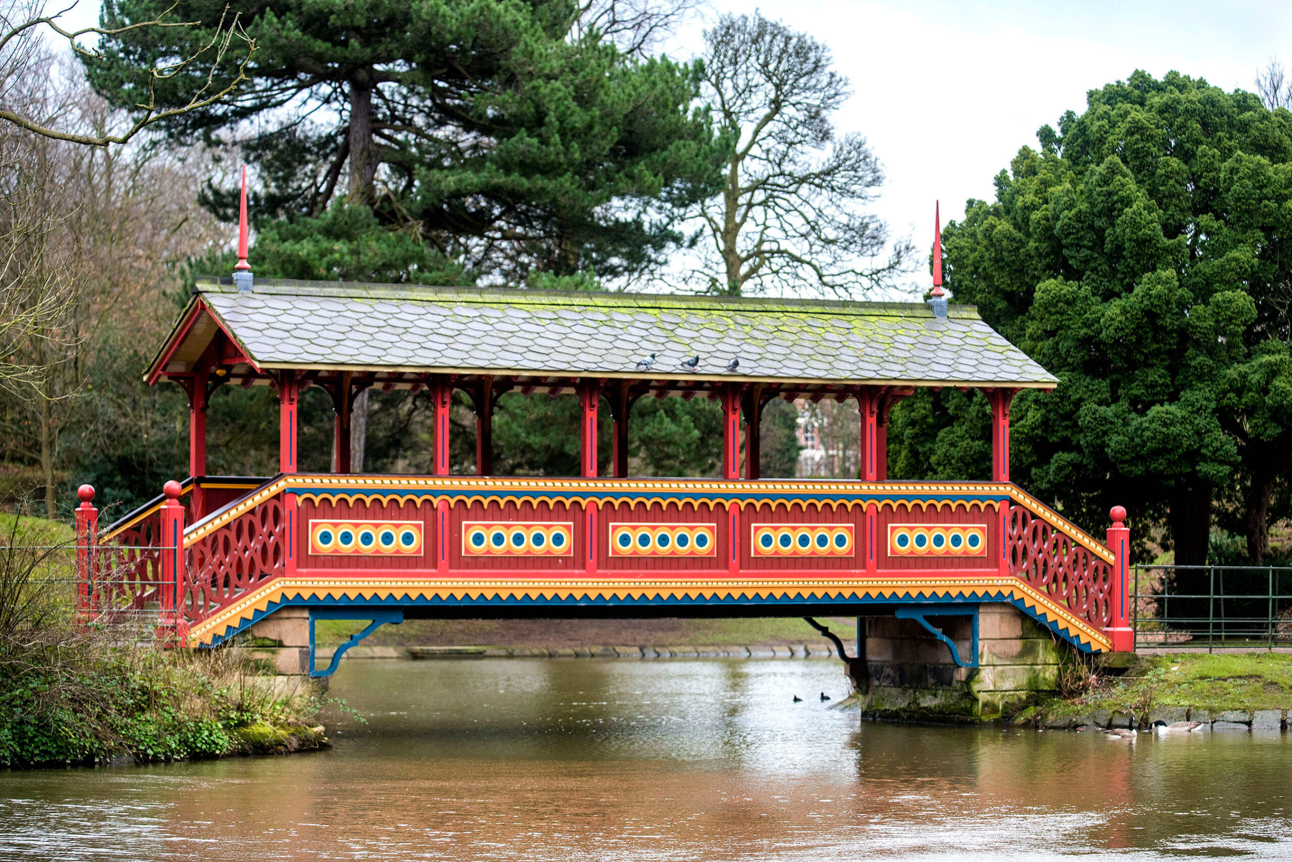 Red covered Bridge in Birkenhead Park
