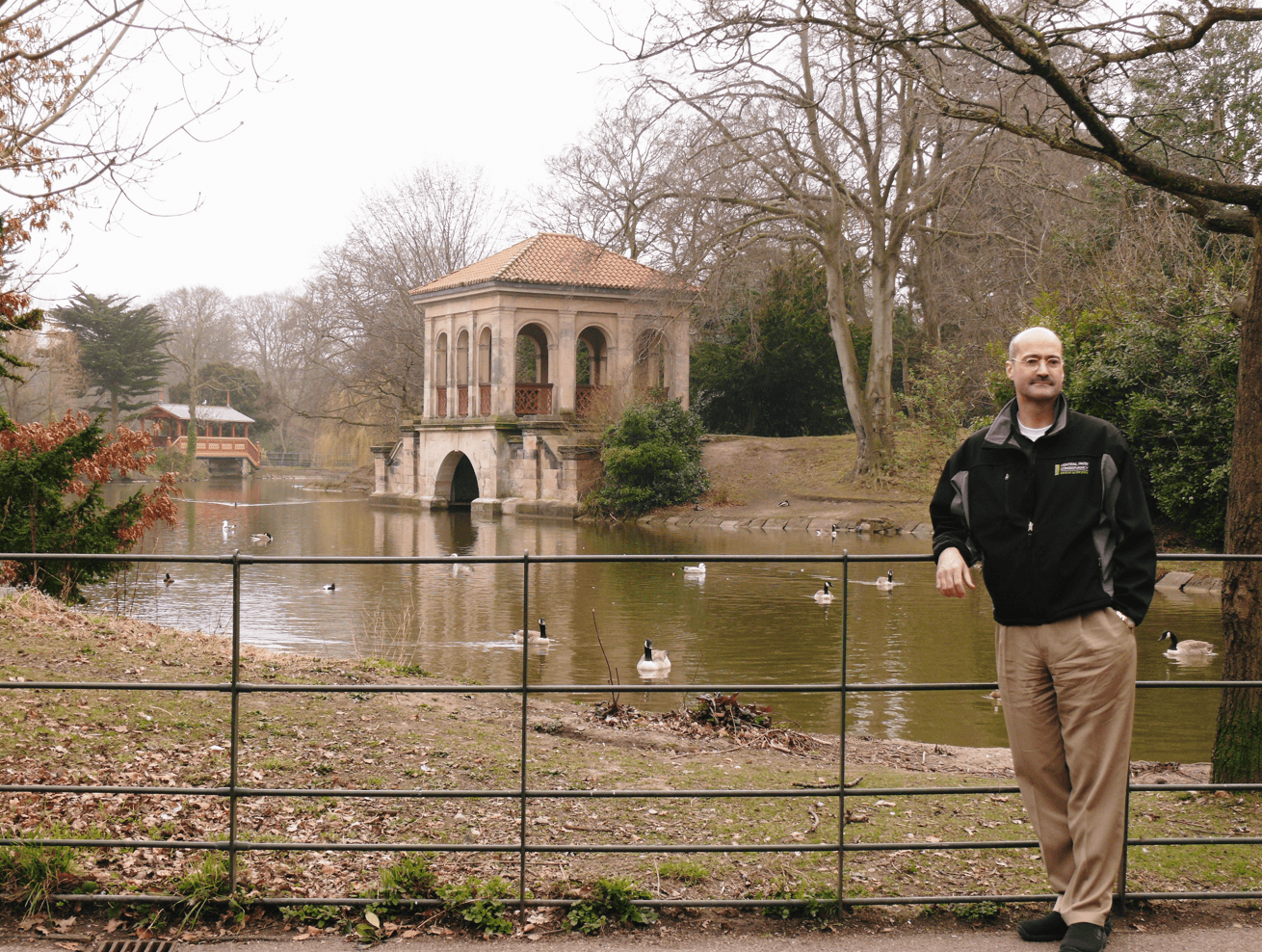 A man standing in front of the Boat House Birkenhead Park